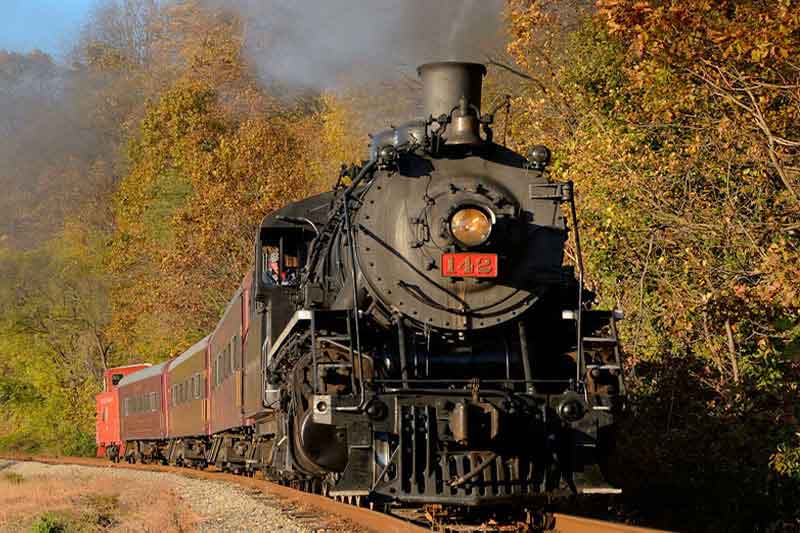 steam engine chugging along the rails