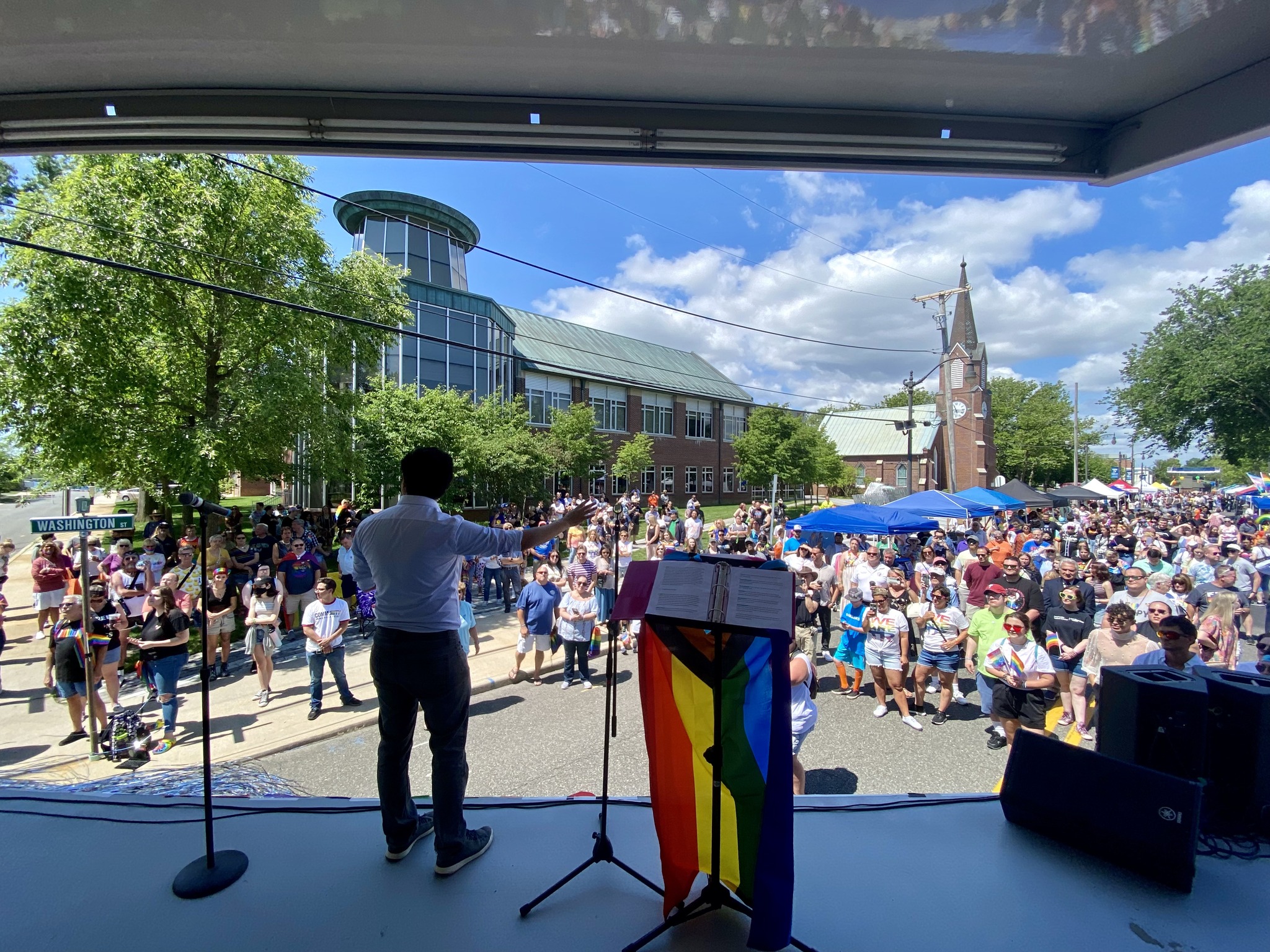 view from stage looking out at crowd during pride festival